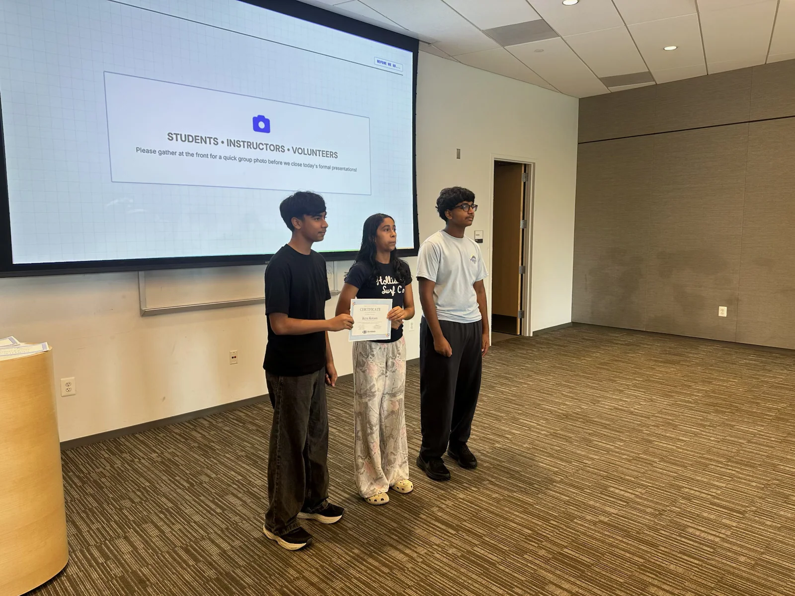 Students receiving recognition after their presentations