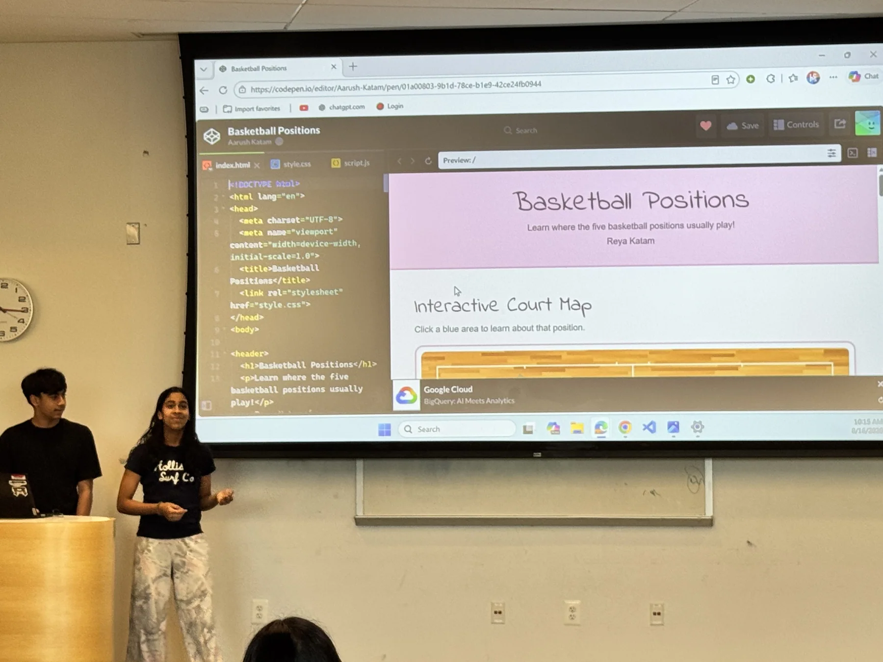 Students demonstrating an interactive website they built